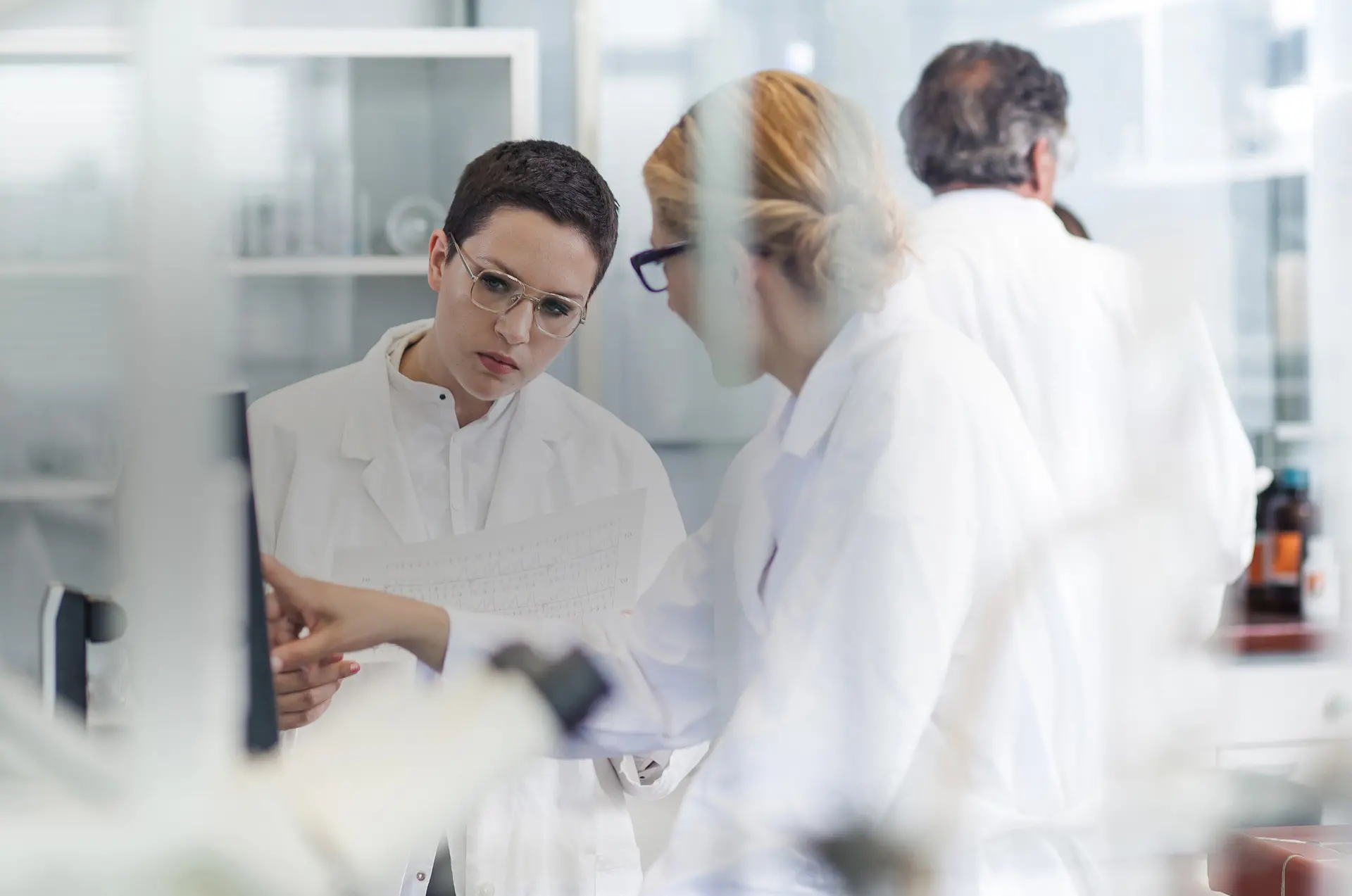 Leerink Partners Biopharma - Two women lab technicians looking at a computer screen