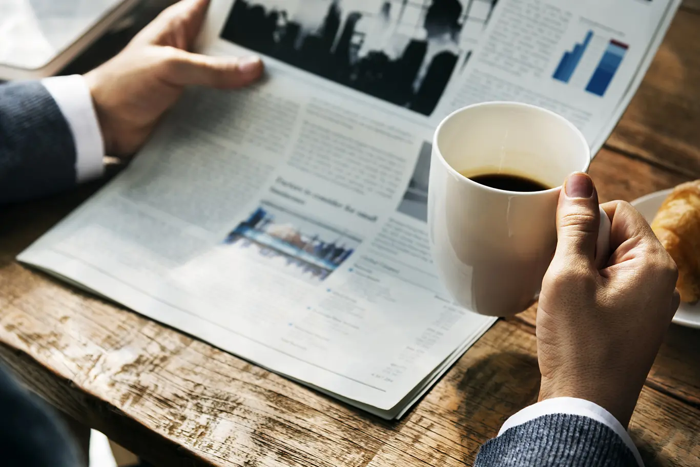 Leerink News Archive - Corporate man reading a newspaper